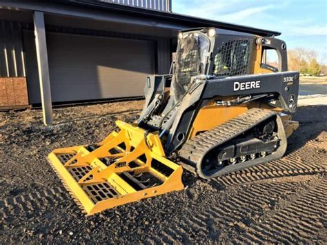 cat skid steer land leveler|leveling ground with a bobcat.